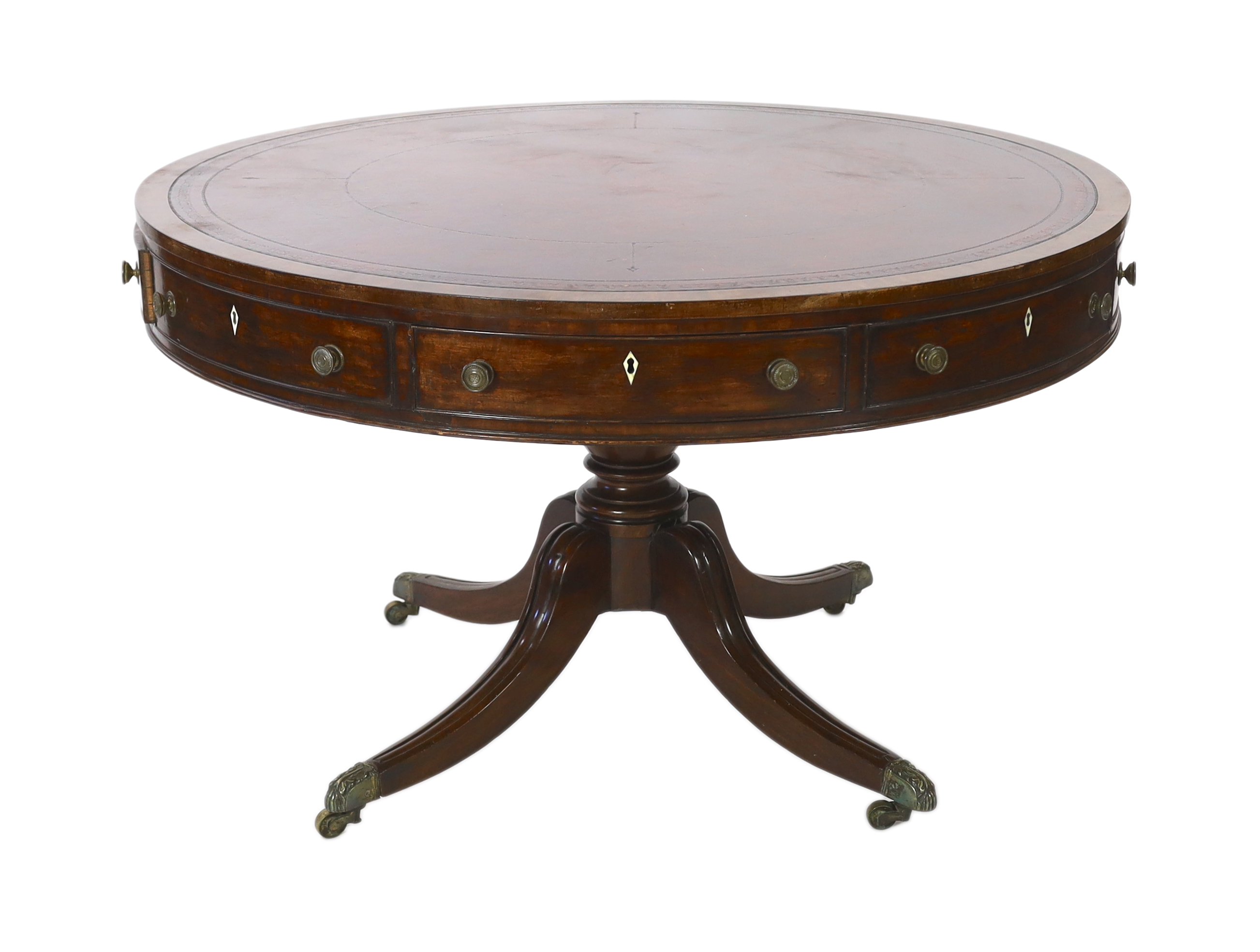 A Regency mahogany drum top library table